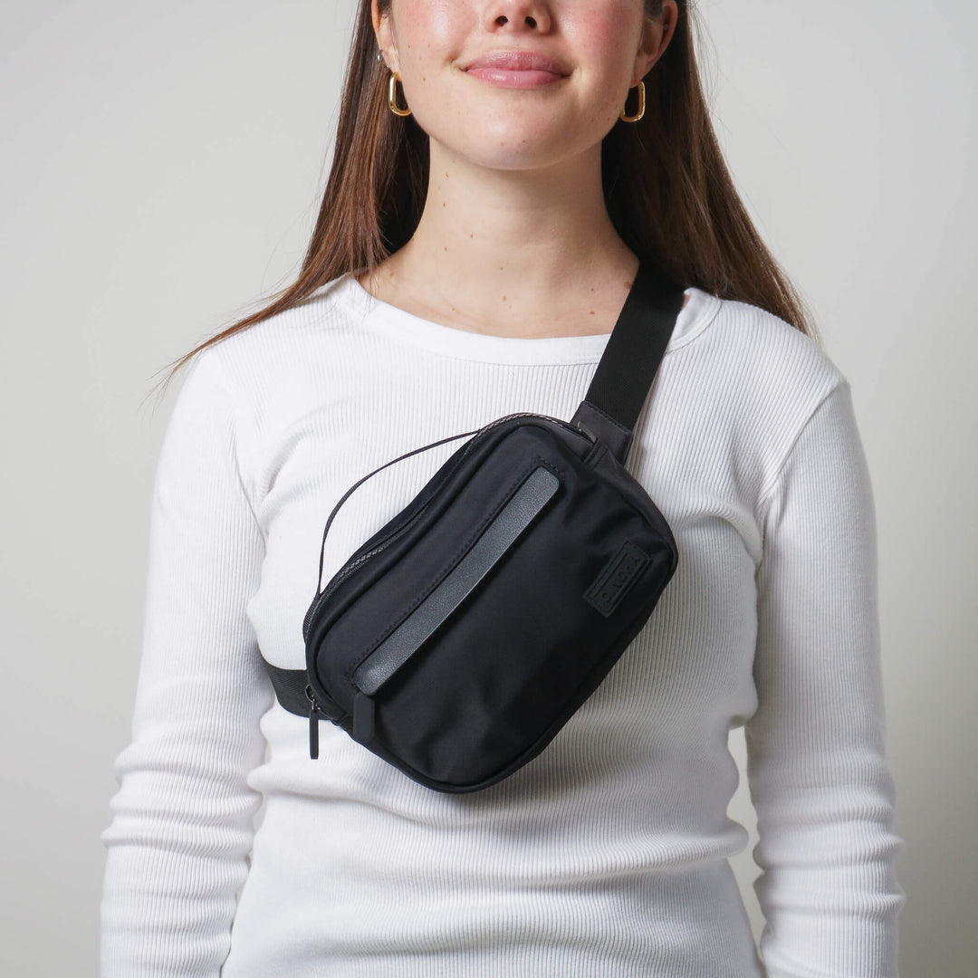 backpack or fanny pack for travel Cincha Travel Belt Bag Jet